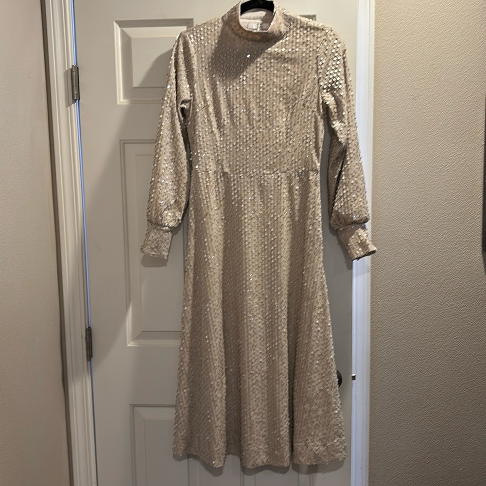 This Epik brand, light beige dress is an x-small.